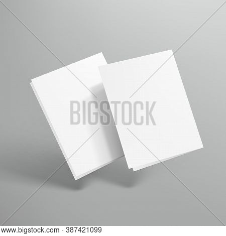 Blank Half Fold Paper Flying On Gray Background