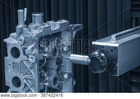 The Multi-axis Cmm Machine Checking The Aluminum Cylinder Head Parts . The Quality Control Of Automo