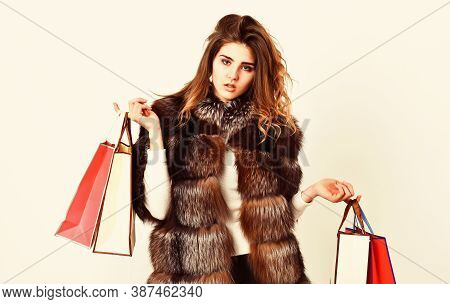 Fashionista Buy Clothes On Black Friday. Girl Makeup Furry Coat Shopping White Background. Shopping 