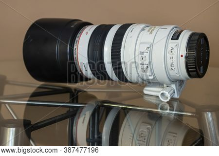 Cologne, Germany - September 28th 2020: A German Photographer Taking Detailed Pictures Of His Canon 
