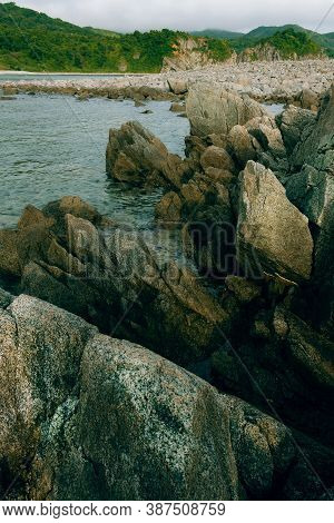 Rockies On The Seashore, Cloudy Weather On The Sea, Coastline Of Telyakovsky Bay Primorsky Krai, Rus
