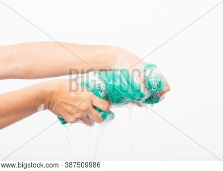 Closeup Young Asian Woman Use Hands Wash Color Clothes. Female Squeeze Wring Out Wet Fabric Cloth Wi