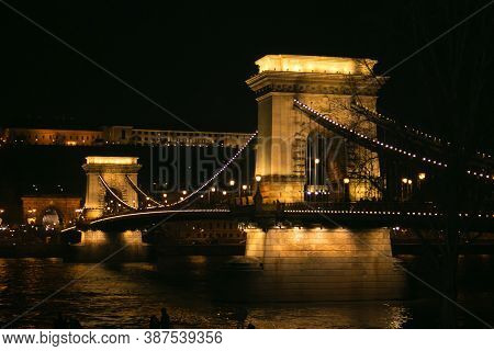 View Of Széchenyi Chain Bridge At Night During Christmas Time In Budapest, Hungary
