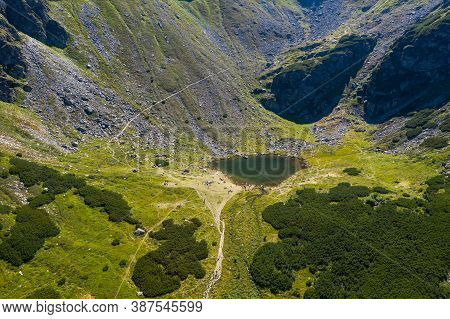 Aerial Drone View Of Iezer Lake, Rodnei Mountains, Eastern Carpathians, Romania