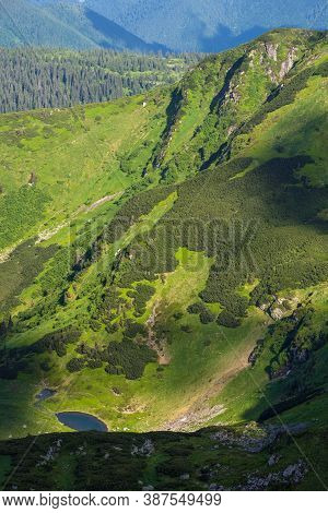 Summer Mountain Landscape With Small Lake In Far. View From Marmaros Pip Ivan Mountain, Carpathian, 