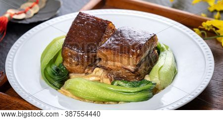 Dong Po Rou (dongpo Pork Meat) In A Beautiful Plate With Green Vegetable, Traditional Festive Food F