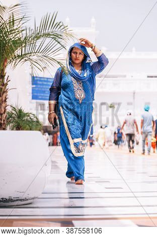 Amritsar, India - August 15: Portrait Of Indian Woman Dressed In Female Traditional Sari (saree) Gar