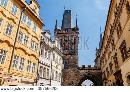 Mostecka Street With A View Of The Bridge Tower Of Charles Bridge, Also Called Malostranska Mostecka
