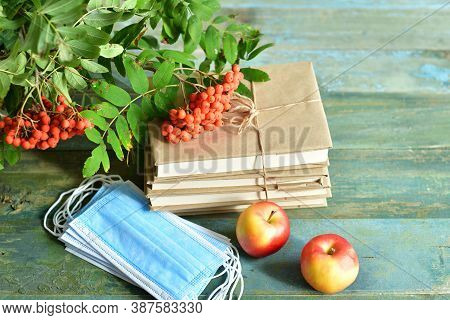 Happy Teacher's Day. Books, Rowan, Apple And Medical Protective Mask With Copy Space, Still Life.cov