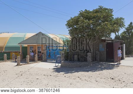 Chernomorsky District, Crimea, Russia - July 21, 2020: Tarkhankut Dolphinarium At Cape Bolshoi Atles