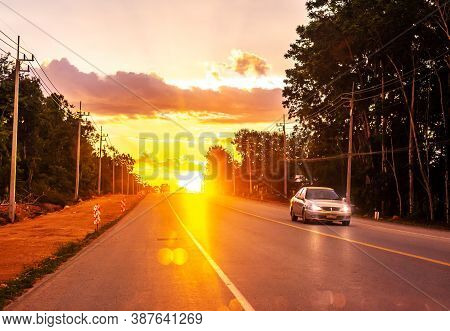 Pattalung, Thailand - August 29, 2020 : Road With Car And Colorful Of Sunset Or Sunrise In Twilight