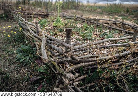 Flower Bed Made Of Twigs In Permaculture Garden