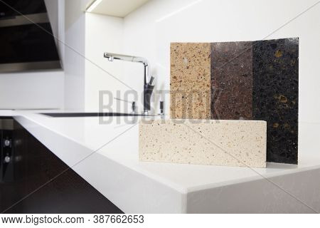 Different Quartz Kitchen Counter Top Samples On White Polished Countertop With Precise Processed Edg