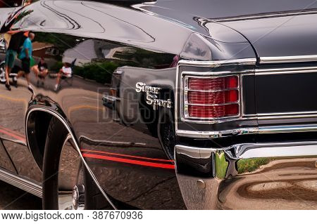 Toronto, Canada - 08 18 2018: Rear Part With Tail Lights In Chrome Frames And Shiny Chrome Bumper Of