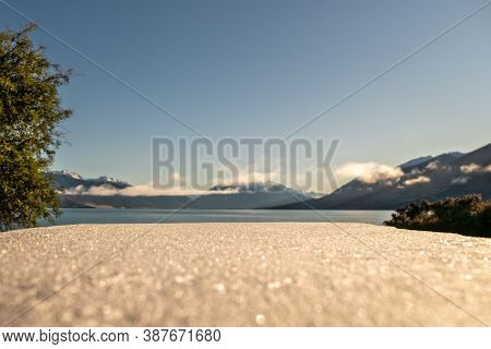 Bbq Table By The Beach At Lake Ohau Covered In Ice On A Cold Frosty Morning