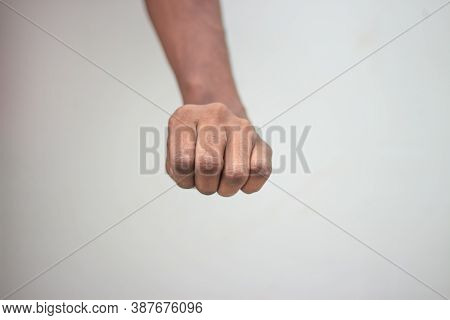 Stone Paper Seser Symbol - Male Showing Stone Sign Hand Isolated On White Background..man Close All 