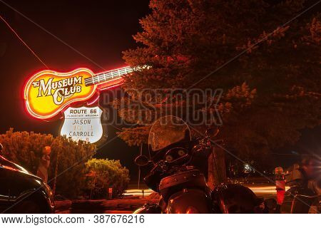 Flagstaff Arizona - September 26 2015; Museum Club Giant Guitar Neon Sign Illuminated On Dark Night 