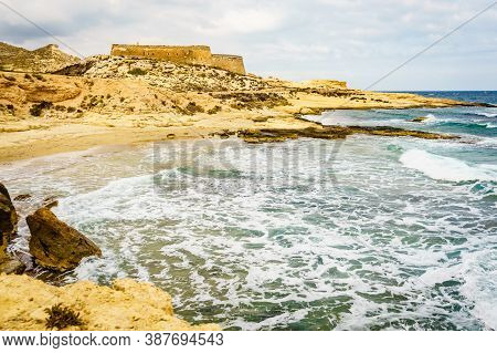 Castle San Ramon Above Beach Of El Playazo, Cabo De Gata Nijar, Province Almer