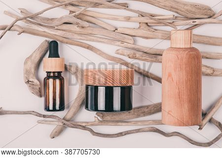Top View Of Wooden And Glass Bottles Containers Blank Mockup For Skincare Beauty Cosmetic Products F