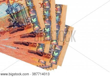 5000 Kazakhstani Tenge Bills Lies In Small Bunch Or Pack Isolated On White. Mockup With Copy Space. 