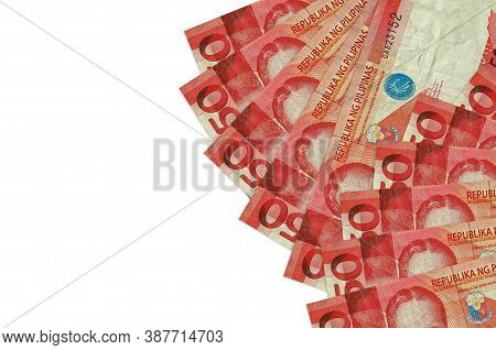 50 Philippine Piso Bills Lies Isolated On White Background With Copy Space. Rich Life Conceptual Bac