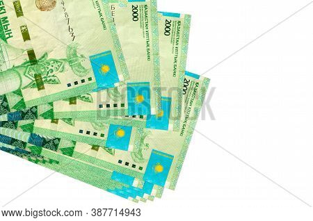 2000 Kazakhstani Tenge Bills Lies In Small Bunch Or Pack Isolated On White. Mockup With Copy Space. 