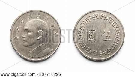 Five Yuan Taiwanese Coin On White Background