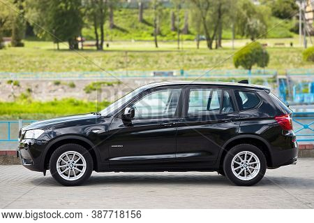 Grodno, Belarus - June 2020: Bmw X3 Ii F25 2.0i Xdrive Selective Focus Left Side View Outdoors On Su