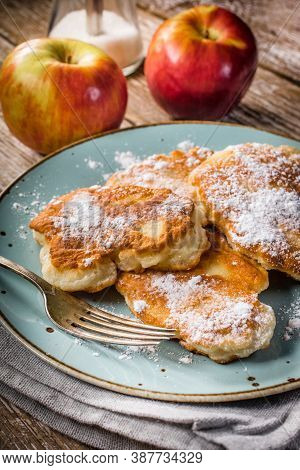 Sweet Pancakes Made Of Apple, Milk And Flour.