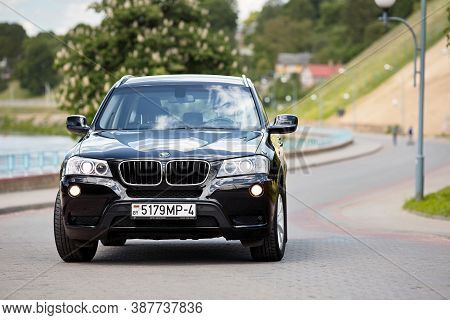 Grodno, Belarus - June 2020: Bmw X3 Ii F25 2.0i Xdrive Selective Focus Front View With Wheels Turned
