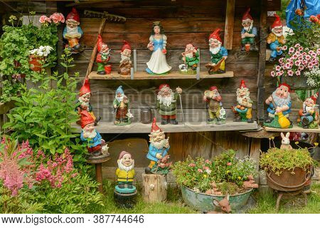 Garden Gnomes Of A Traditional House At Tasch Near Zermatt On The Swiss Alps