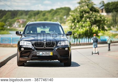 Grodno, Belarus - June 2020: Bmw X3 Ii F25 2.0i Xdrive Selective Focus Front View With Boys Passing 