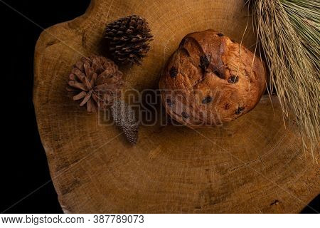 Panettone With Chocolate Chips On Rustic Wood, Top View