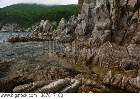 Rock And The Sea, The Rocky Coastline, The Bay Telyakovsky Primorsky Krai, Russia.