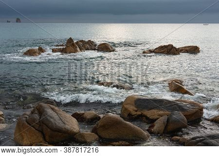 Rocky Seashore, Cloudy Weather At Sea, Coastline Of Telyakovsky Bay Primorsky Krai, Russia.