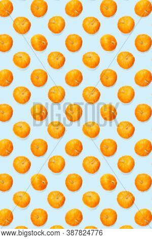 Autumn Background Made Frem Pumpkin. Background Of Orange Miniature Pumpkins. Thanksgiving Or Hallow