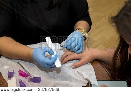 Manicuring Of A Teenege Girl Unkempt Nails, Indoor Close-up