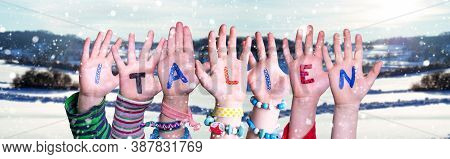 Children Hands Building Word Italien Means Italy, Snowy Winter Background