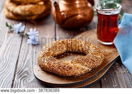 Freshly Baked Simit Baked Goods With Sesame Seeds Close-up (turkish Bagel - Gevrek Or Kuluri). Tradi