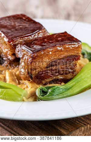 Dong Po Rou (dongpo Pork Meat) In A Plate With Green Vegetable, Traditional Festive Food For Chinese