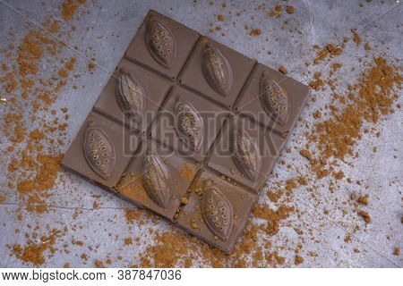 Chocolate Bar In Brown Background