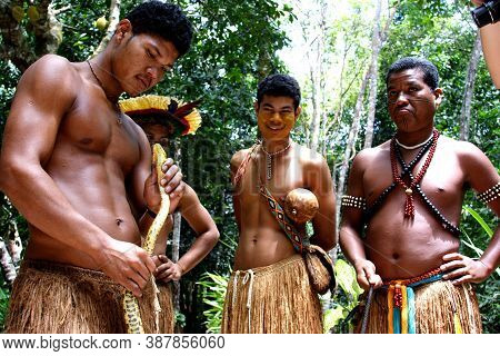 Porto Seguro, Bahia / Brazil - April 13, 2006: Pataxo Indians Are Seen In The Jaqueira Village In Th