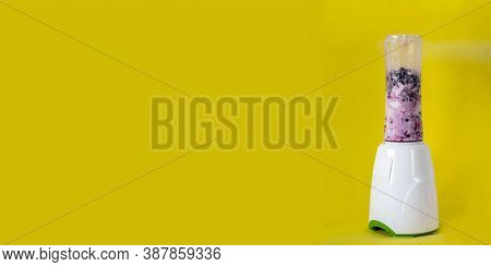 Smoothie With Cottage Cheese And Fresh Berries On A Solid Yellow Background