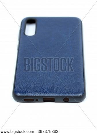 Moscow, Russia - February 22, 2020: Dark Blue Smartphone On A White Background In A Transparent Case