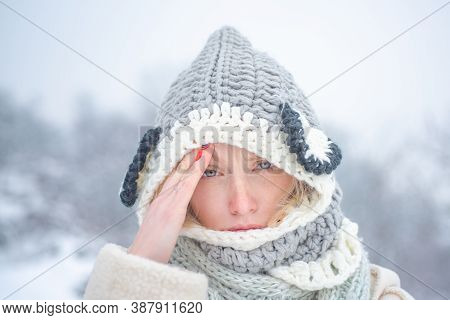 Allergy Winter Season. Woman Having Headache On Snow Background