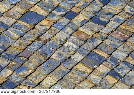 Slate Roof Background At Ethno Village Sirogojno, Serbia. Roof Made Of Cut Stones.
