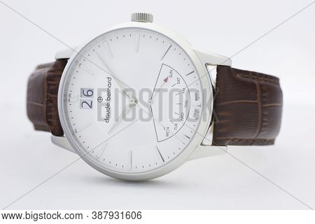 Geneve, Switzerland 01.10.2020 - Claude Bernard Man Swiss Made Watch White Dial Leather Strap Isolat
