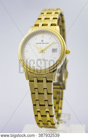Geneve, Switzerland 01.10.2020 - Claude Bernard Swiss Made Watch Gold Pvd Coating White Dial Metal B