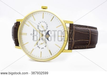Geneve, Switzerland 01.10.2020 - Claude Bernard Man Swiss Made Watch Moon Calendar Gold Pvd Coating 