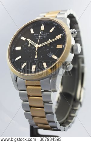Geneve, Switzerland 01.10.2020 - Claude Bernard Man Swiss Made Watch Gold Pvd Coating Black Dial Met